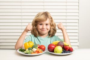 girl eating healthy fruit