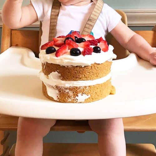 first birthday smash cake on high chair 500x500 1