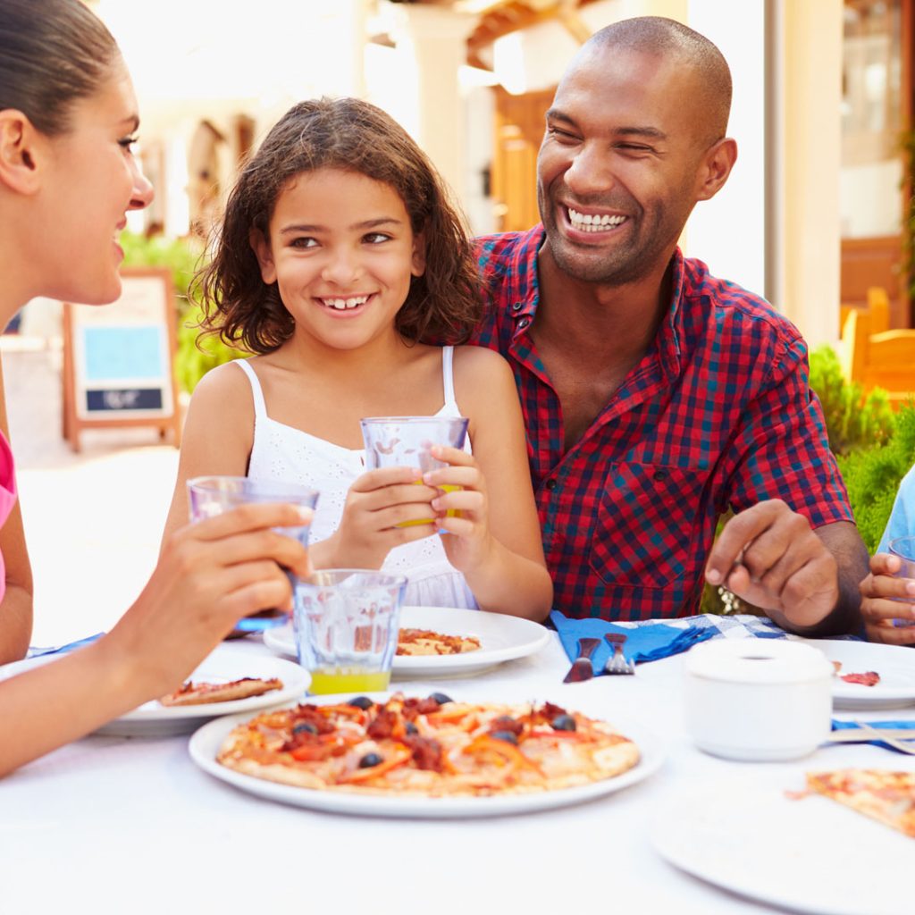 family eating dinner istock